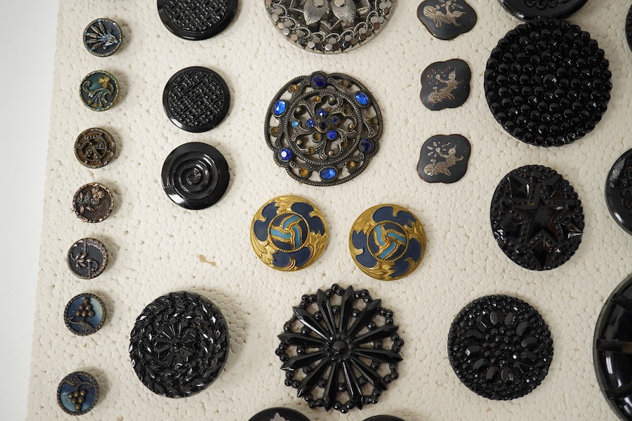 A collection of assorted Victorian and later jet, simulated jet and other decorative buttons, largest 50mm. Condition - good